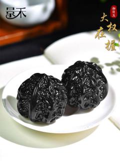 和田玉墨玉是什么?揭秘文玩界的黑色瑰宝